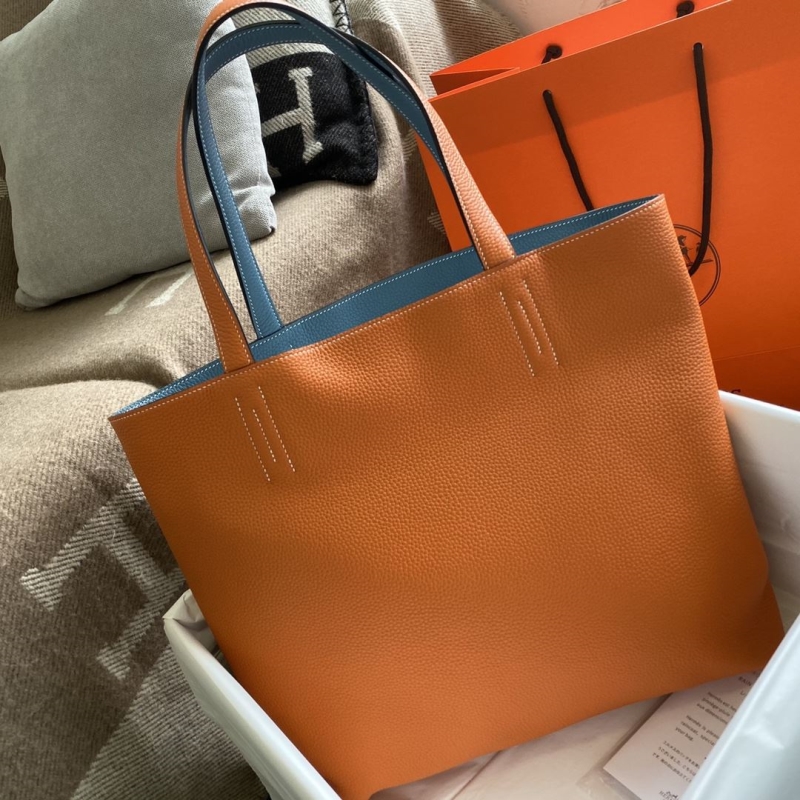 H**mes shopping bags